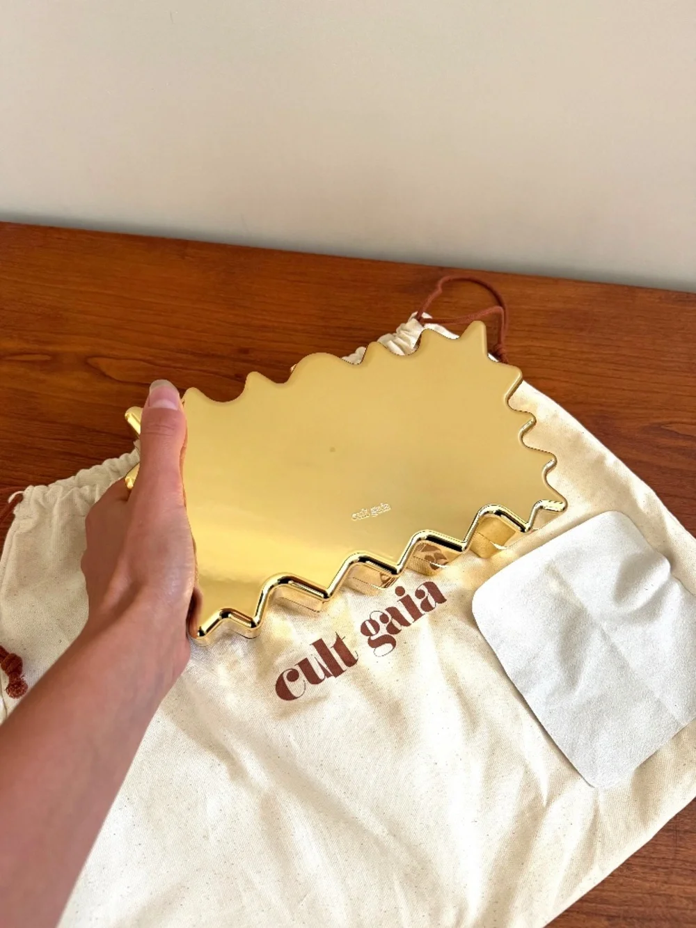 Gold Cult Gaia clutch